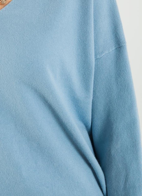 Jersey pico asimetrico