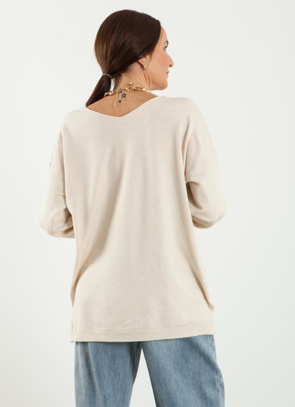 Jersey pico asimetrico