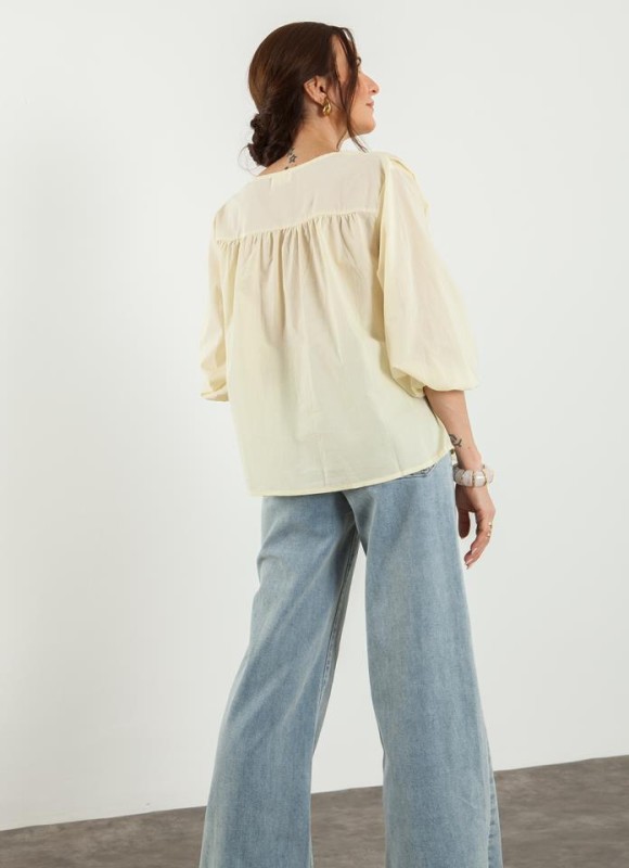 Blusa pico botones