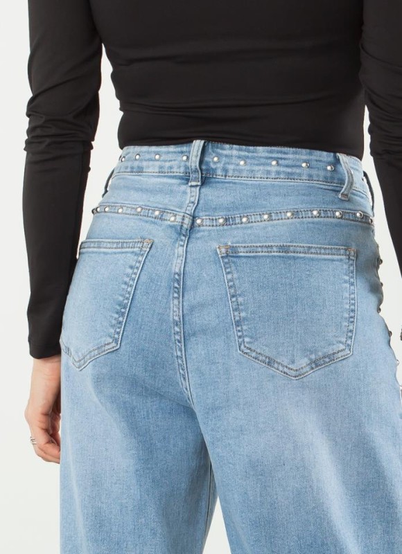 JEANS ASIMETRICO TACHAS