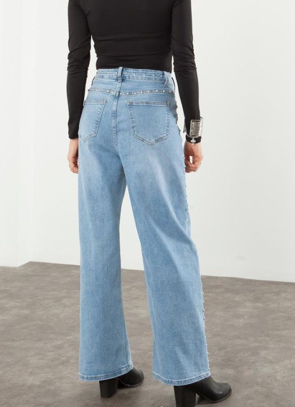 JEANS ASIMETRICO TACHAS