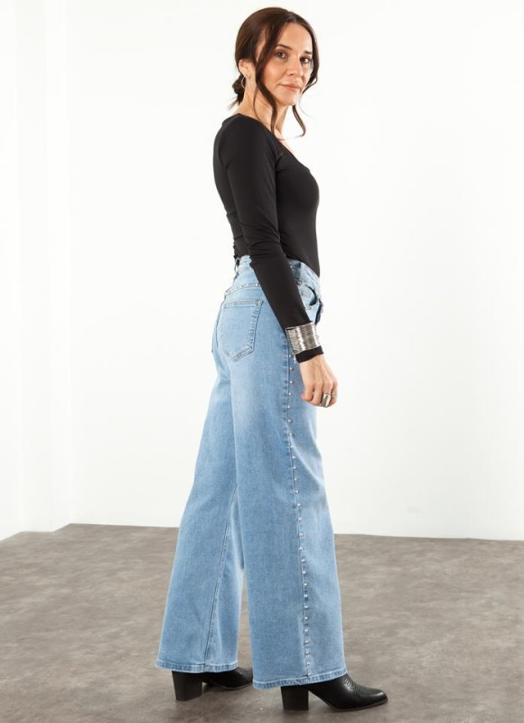JEANS ASIMETRICO TACHAS